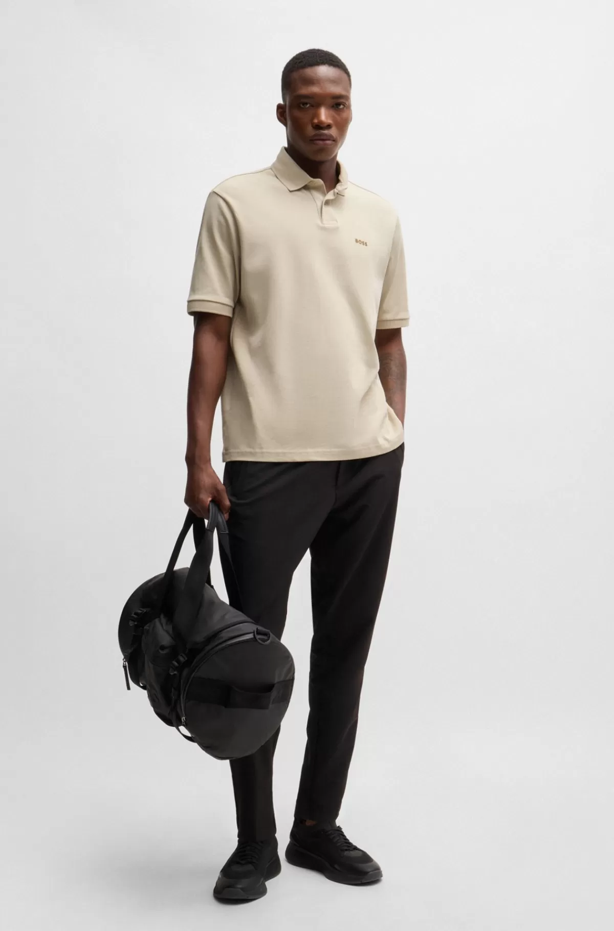 poloshirt_i_bomuldsjersey_med_printet_grafik_6.webp HUGO BOSS Poloshirt I Bomuldsjersey Med Printet Grafik Lys beige Best